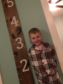 A picture containing indoor, wall, person, floor

Description automatically generated